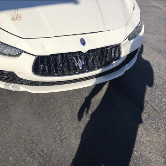 White Car Grill Damaged
