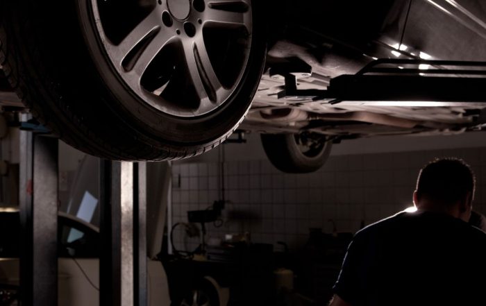 local collision repair leader fixing a car