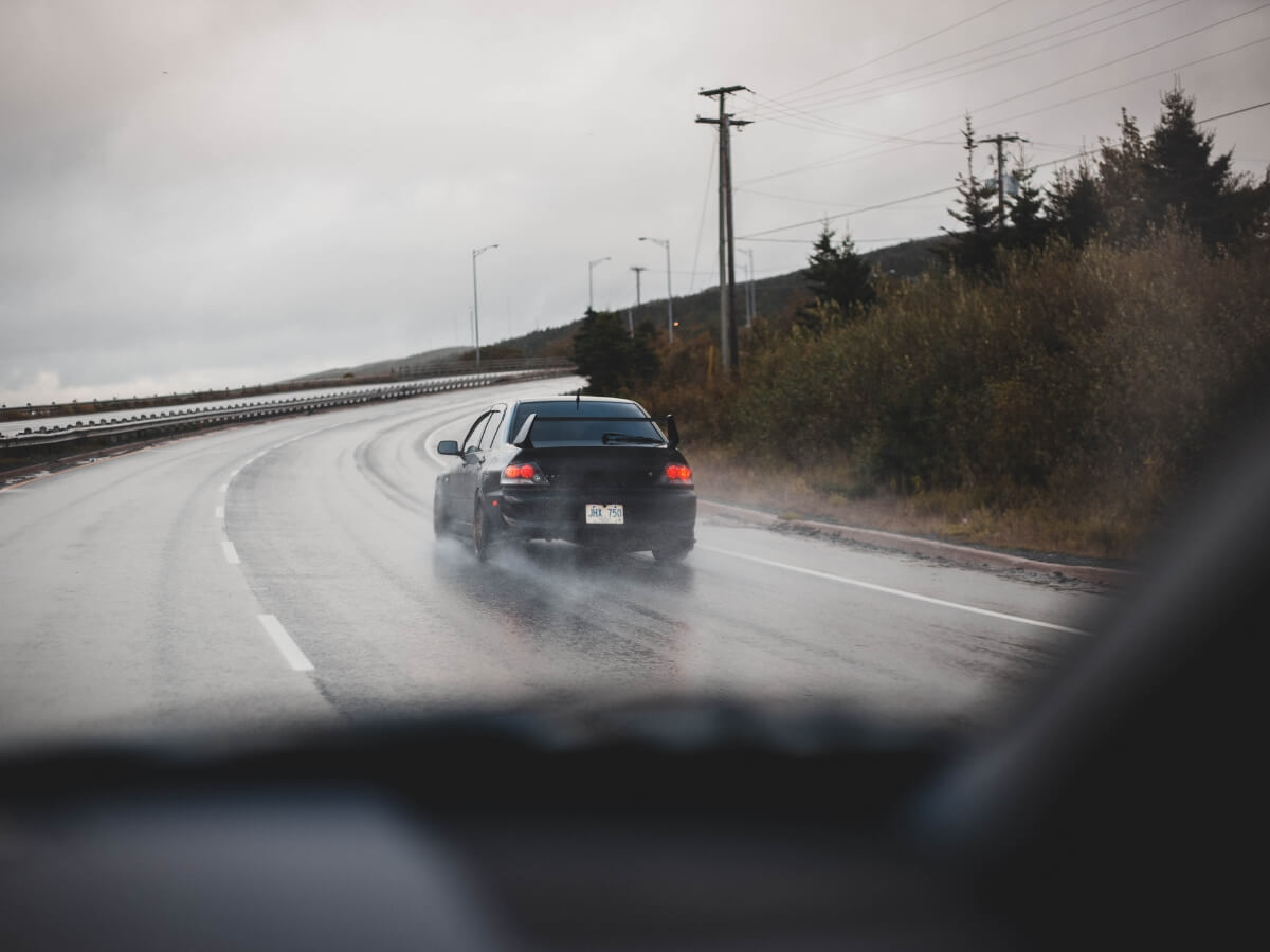 Car Driving on a wet road