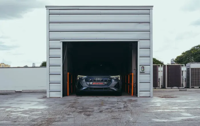 Luxury car inside a secure vehicle storage in Arizona facility, protected by an enclosed unit from heat and weather